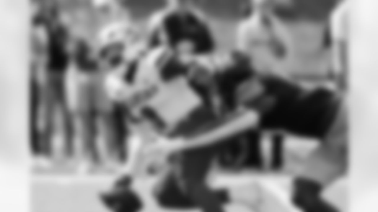 Kansas quarterback Jalon Daniels, is unable to get away from Missouri defensive end Zion Young, right, fumbling the ball during the first half of an NCAA college football game on Saturday, Sept. 6, 2025, in Columbia, Mo. (AP Photo/Colin E. Braley)