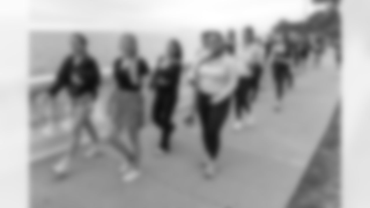 TAMPA, FL - December 06, 2025 - She is Football Bayshore Walk: Raise The Flags event with Bayshore Breakfast Club and Tampa Girls Social & Wellness at Hyde House Public Studio. Photo By Mike Carlson/Tampa Bay Buccaneers