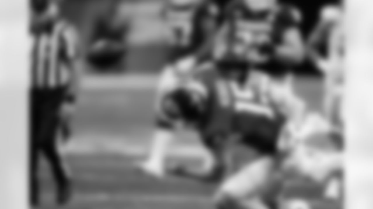 Oregon defensive back Jadon Canady (22) forces a fumble by Indiana quarterback Fernando Mendoza (15) during the second half of the Peach Bowl NCAA college football playoff semifinal, Friday, Jan. 9, 2026, in Atlanta. (AP Photo/Mike Stewart)