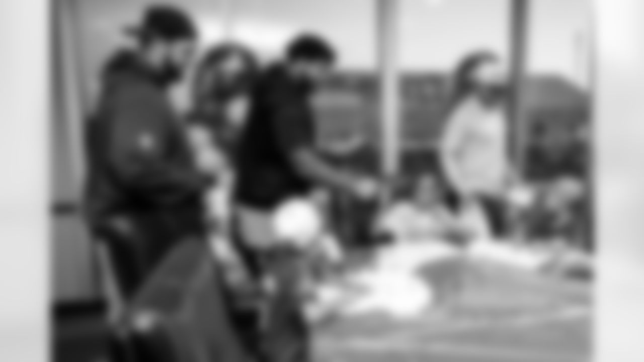 TAMPA, FL - November 19, 2025 - Guard Ben Bredeson #68, Tackle Tristan Wirfs #78, and Quarterback Baker Mayfield #6 of the Tampa Bay Buccaneers during a visit with Triumph Together Cancer Warriors. Photo By Kyle Zedaker/Tampa Bay Buccaneers