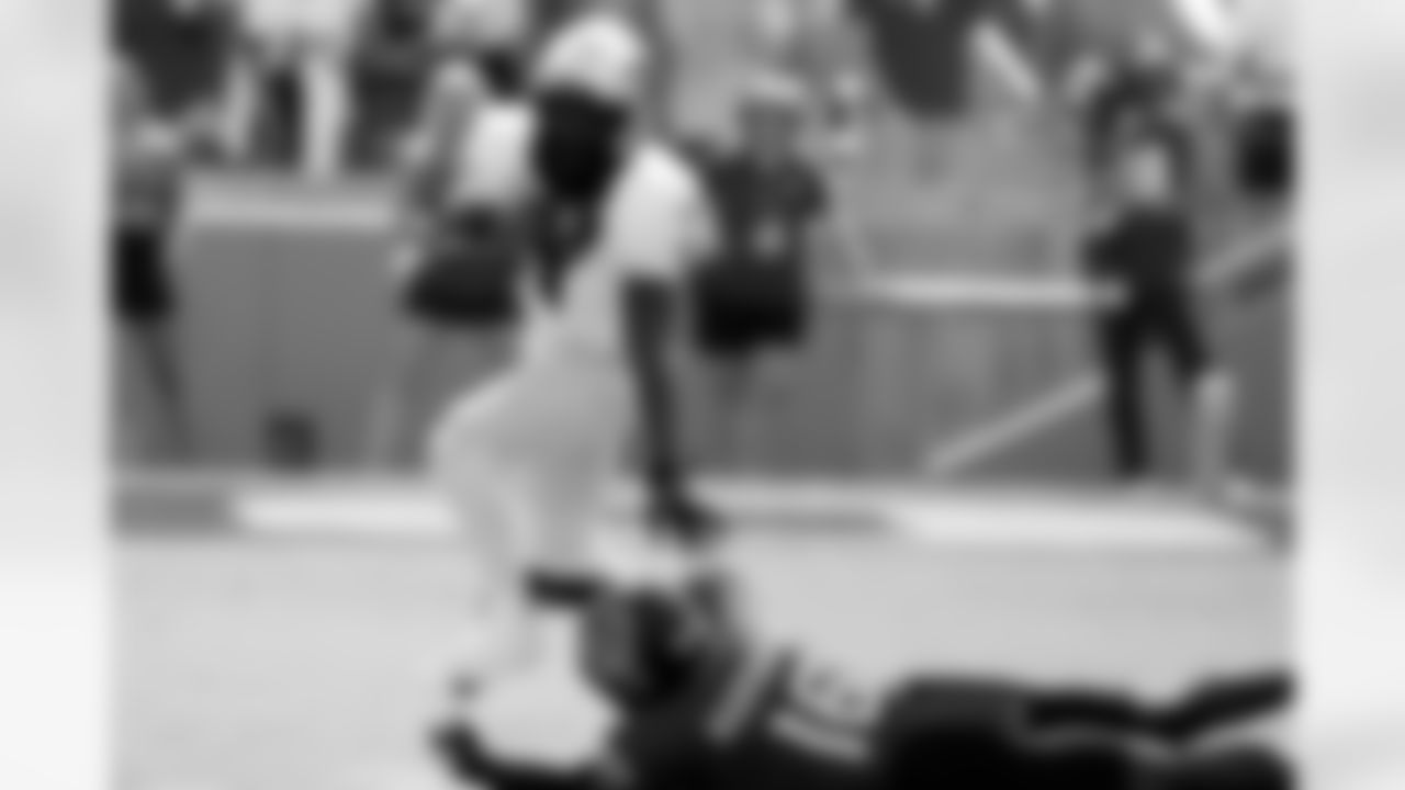 Wake Forest running back Demond Claiborne (1) runs the ball past North Carolina State's Devon Marshall (16) during the first half of an NCAA college football game in Raleigh, N.C., Saturday, Oct. 5, 2024. (AP Photo/Karl B DeBlaker)