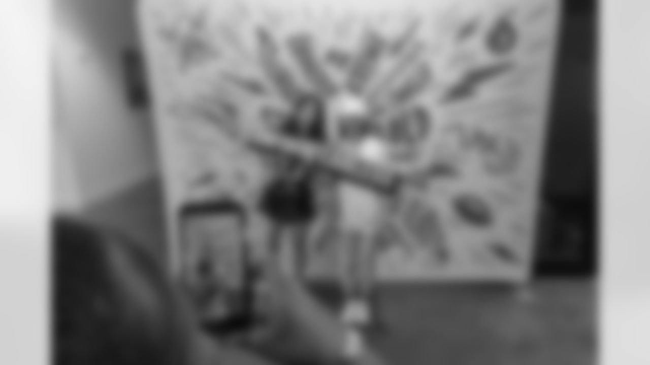 TAMPA, FL - December 06, 2025 - She is Football Bayshore Walk: Raise The Flags event with Bayshore Breakfast Club and Tampa Girls Social & Wellness at Hyde House Public Studio. Photo By Mike Carlson/Tampa Bay Buccaneers