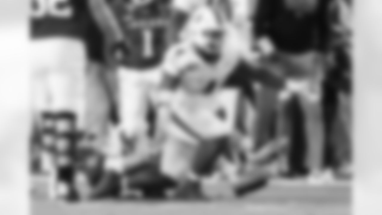 Indiana quarterback Fernando Mendoza is sacked by Miami defensive lineman Rueben Bain Jr. during the second half of the College Football Playoff national championship game, Monday, Jan. 19, 2026, in Miami Gardens, Fla.(AP Photo/Marta Lavandier)