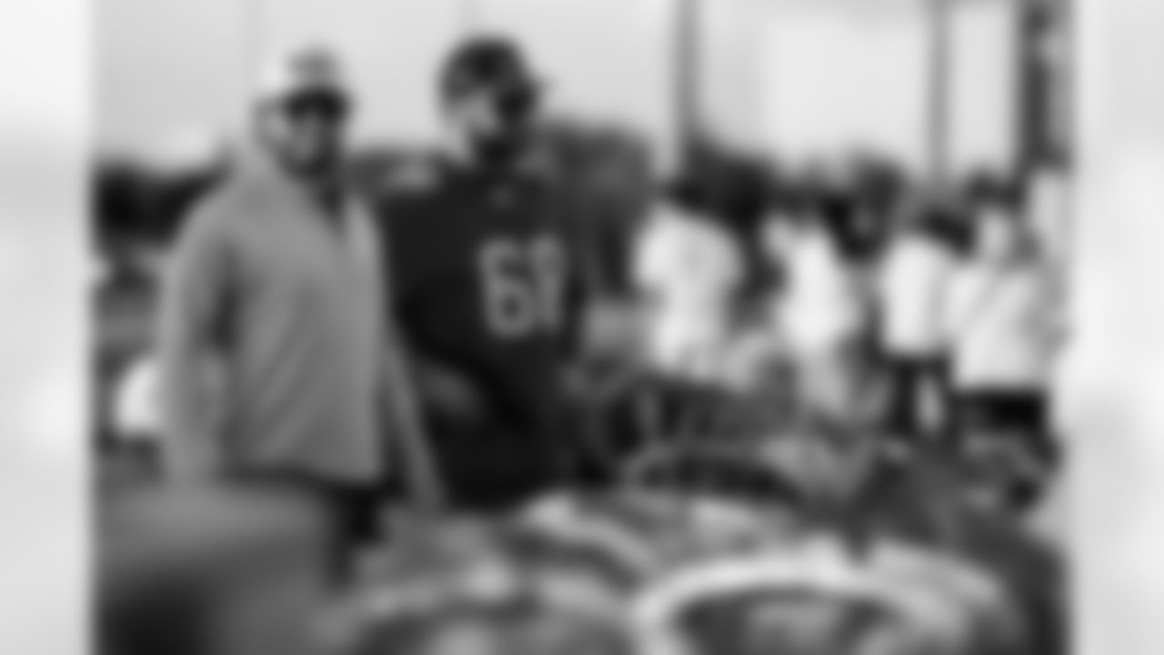 TAMPA, FL - November 25, 2025 - Quarterback Baker Mayfield #6 and Guard Ben Bredeson #68 of the Tampa Bay Buccaneers during Turkey Time with the O-Line. Photo By Kyle Zedaker/Tampa Bay Buccaneers