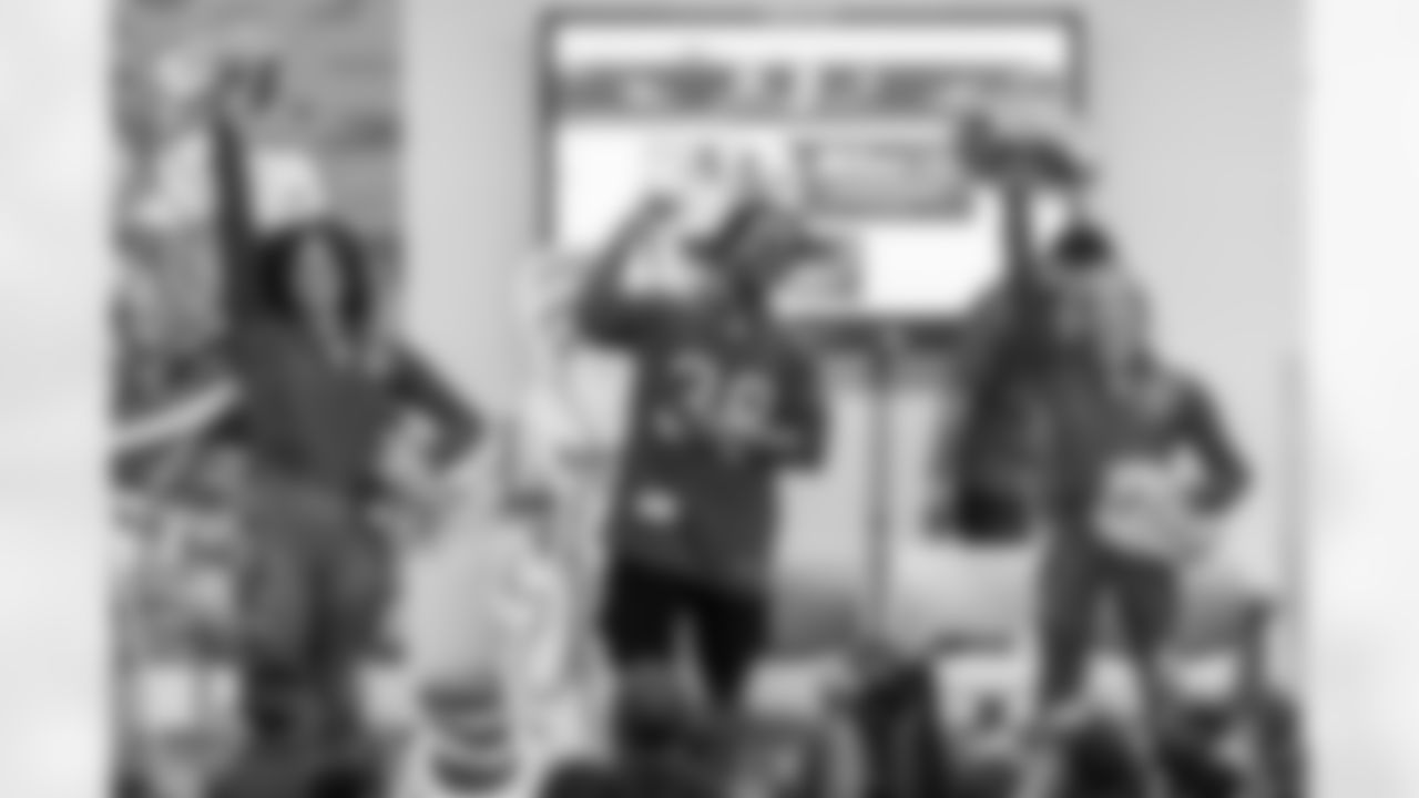 TAMPA, FL - March 03, 2026 - Safety Rashad Wisdom #38 of the Tampa Bay Buccaneers and Tampa Bay Buccaneers Cheerleaders during the National Reading Month celebration hosted by The Tampa Bay Buccaneers and Dr. Seuss Enterprises at Potter Elementary School. Photo By Doug DeFelice/Tampa Bay Buccaneers