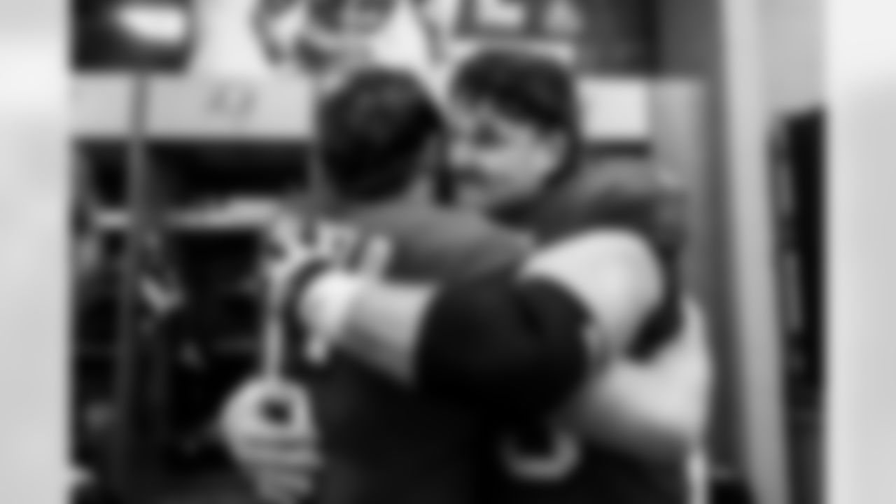 TAMPA, FL - November 30, 2025 - Quarterback Baker Mayfield #6 and Guard Dan Feeney #65 of the Tampa Bay Buccaneers after the game between the Arizona Cardinals and Tampa Bay Buccaneers. The Bucs won the game, 20-17. Photo By Tori Richman/Tampa Bay Buccaneers