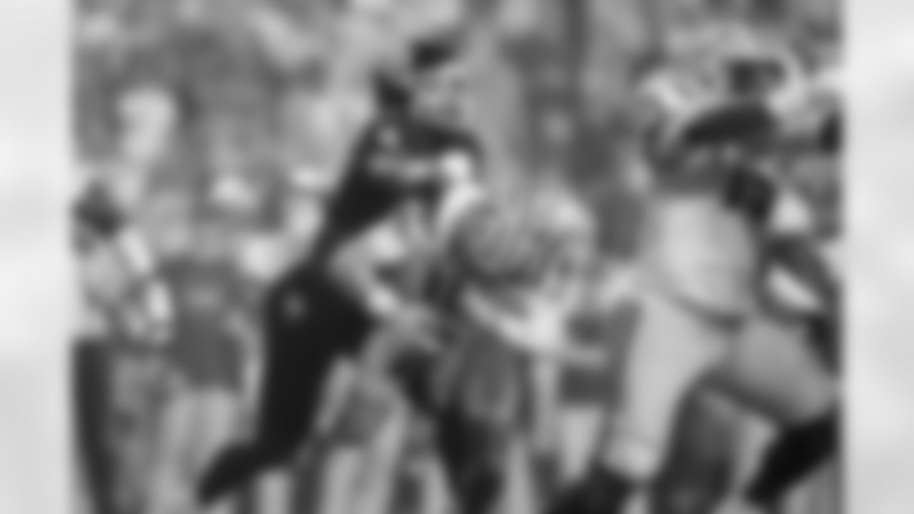 LSU quarterback Garrett Nussmeier (18) is sacked by Texas A&M defensive end Cashius Howell (9) in the first half of an NCAA college football game, Saturday, Oct. 25, 2025 in Baton Rouge, La. (AP Photo/Gerald Herbert)