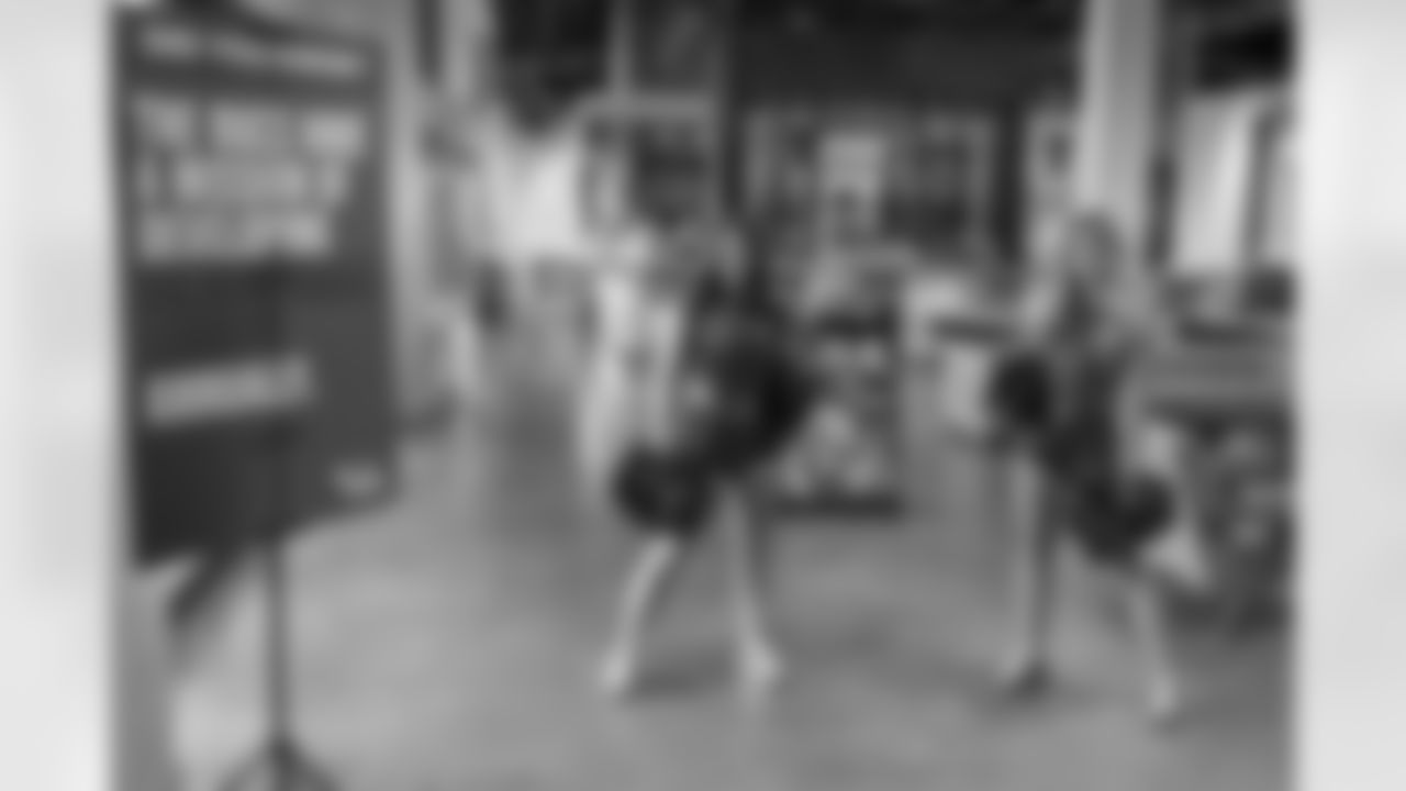 TAMPA, FL - December 06, 2025 - Tampa Bay Buccaneers Cheerleaders during the She is Football Bayshore Walk: Raise The Flags event with Bayshore Breakfast Club and Tampa Girls Social & Wellness at Hyde House Public Studio. Photo By Mike Carlson/Tampa Bay Buccaneers