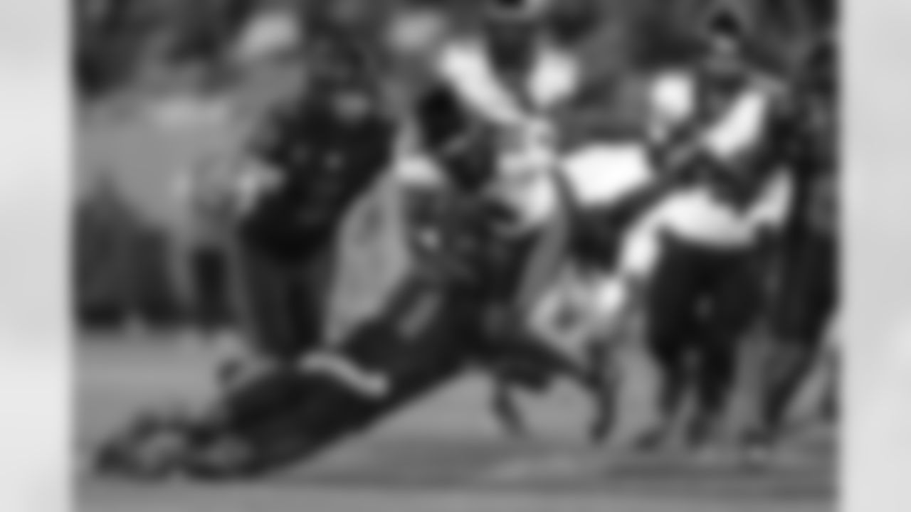 Oregon State running back Jam Griffin (8) is tackled by San Diego State cornerback Chris Johnson (1) by during the first half of an NCAA college football game Saturday, Sept. 7, 2024, in San Diego. (AP Photo/Raul Romero Jr.)