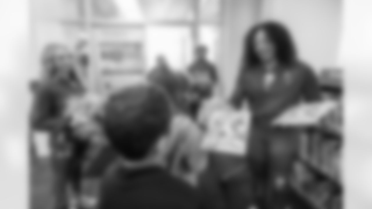 TAMPA, FL - March 03, 2026 - Safety Rashad Wisdom #38 of the Tampa Bay Buccaneers and Tampa Bay Buccaneers Cheerleaders during the National Reading Month celebration hosted by The Tampa Bay Buccaneers and Dr. Seuss Enterprises at Potter Elementary School. Photo By Doug DeFelice/Tampa Bay Buccaneers