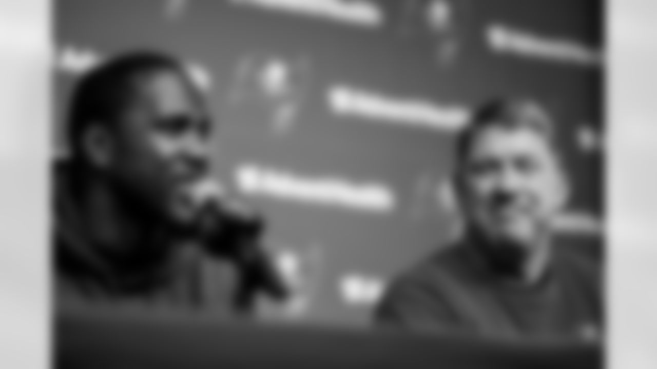 TAMPA, FL - March 22, 2024 - Inside Linebacker Lavonte David #54 of the Tampa Bay Buccaneers and General Manager Jason Licht during a press conference after he signed his contract at AdventHealth Training Center. Photo By Tori Richman/Tampa Bay Buccaneers
