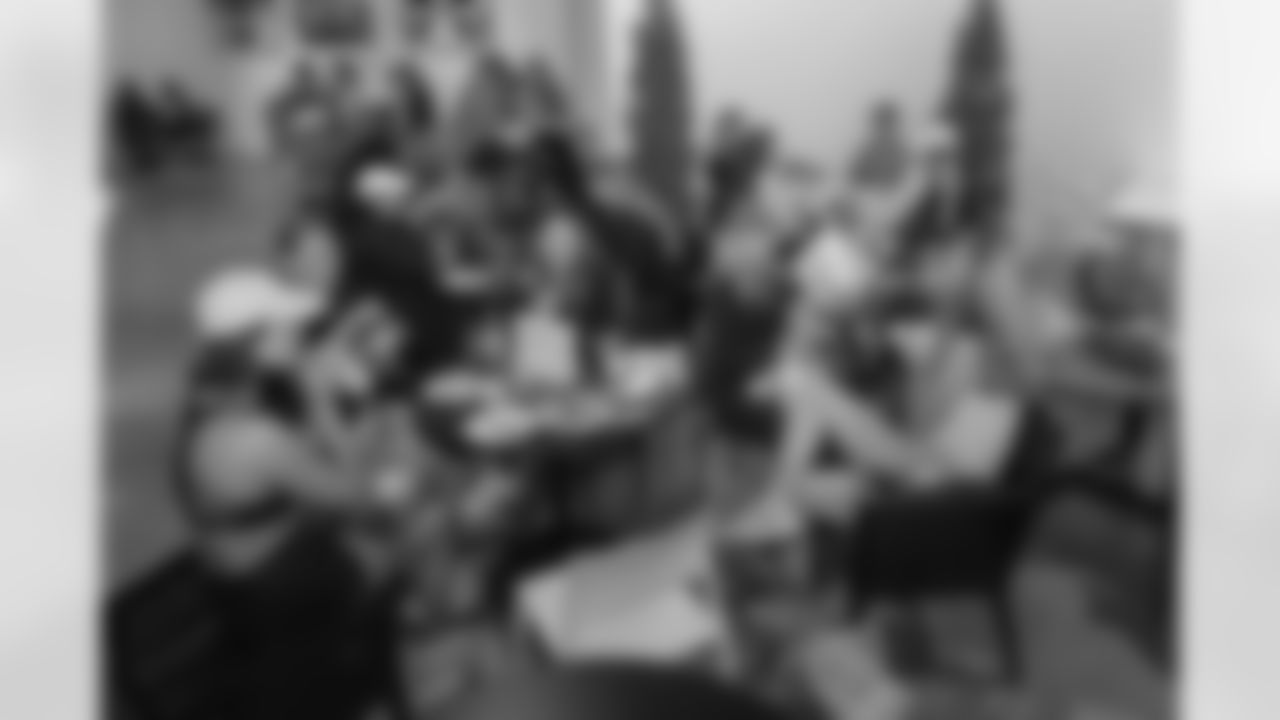 TAMPA, FL - December 06, 2025 - She is Football Bayshore Walk: Raise The Flags event with Bayshore Breakfast Club and Tampa Girls Social & Wellness at Hyde House Public Studio. Photo By Mike Carlson/Tampa Bay Buccaneers