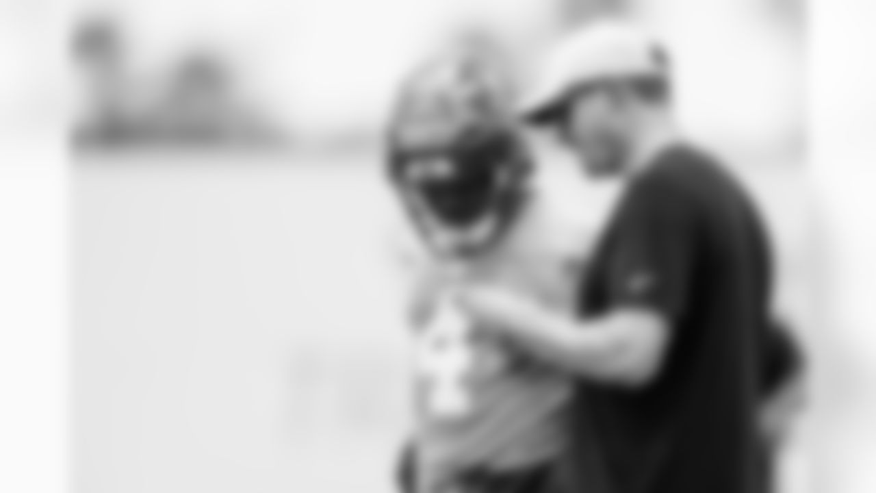 TAMPA, FL - May 09, 2025 - Quarterback Jordan McCloud #4 of the Tampa Bay Buccaneers and Offensive Coordinator Josh Grizzard of the Tampa Bay Buccaneers during 2025 Rookie Mini Camp at AdventHealth Training Center. Photo By Tori Richman/Tampa Bay Buccaneers