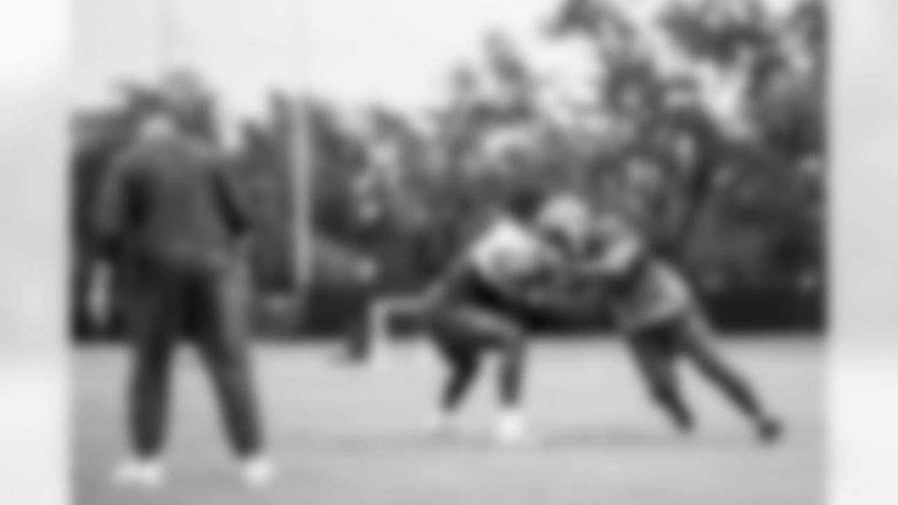 TAMPA, FL - November 06, 2025 - Offensive Tackle Benjamin Chukwuma #70 and Outside Linebacker Chris Braswell #43 of the Tampa Bay Buccaneers during practice at AdventHealth Training Center. Photo By Tori Richman/Tampa Bay Buccaneers