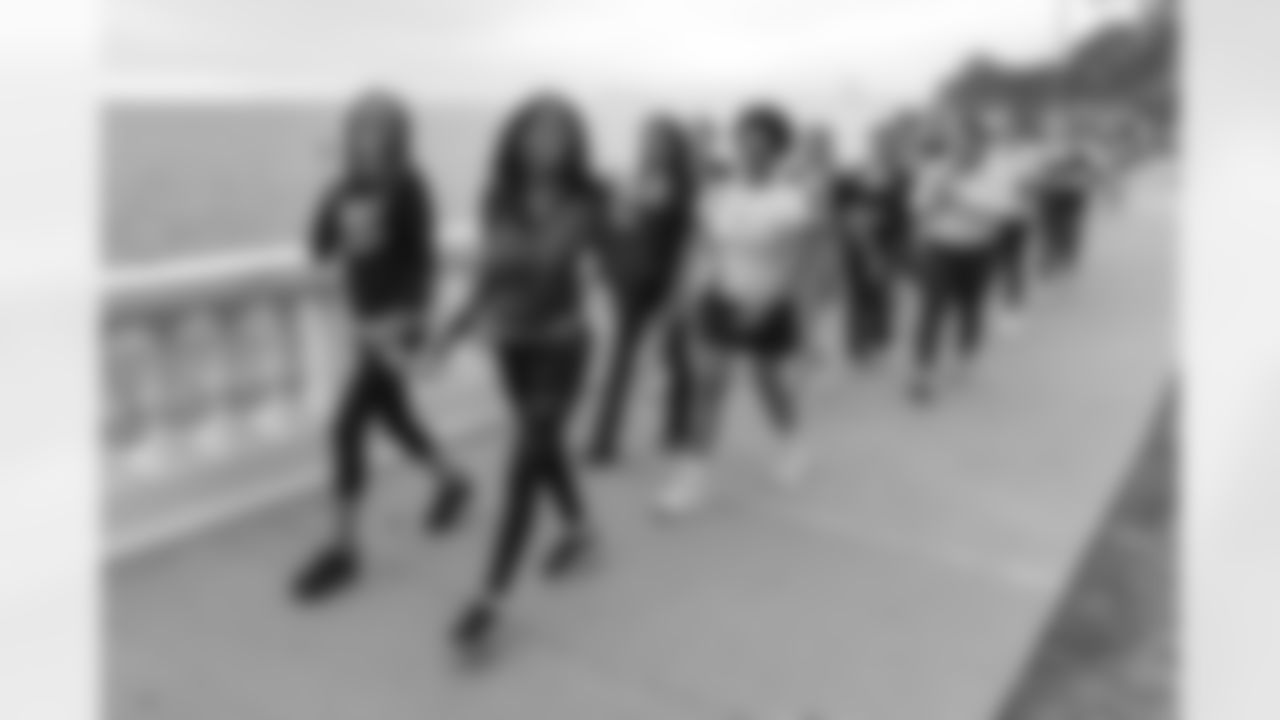 TAMPA, FL - December 06, 2025 - She is Football Bayshore Walk: Raise The Flags event with Bayshore Breakfast Club and Tampa Girls Social & Wellness at Hyde House Public Studio. Photo By Mike Carlson/Tampa Bay Buccaneers