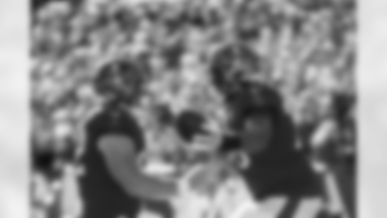 TAMPA, FL - November 30, 2025 - Center Graham Barton #62 and Tackle Tristan Wirfs #78 of the Tampa Bay Buccaneers celebrate a touchdown during the game between the Arizona Cardinals and Tampa Bay Buccaneers. The Bucs won the game, 20-17. Photo By Kyle Zedaker/Tampa Bay Buccaneers