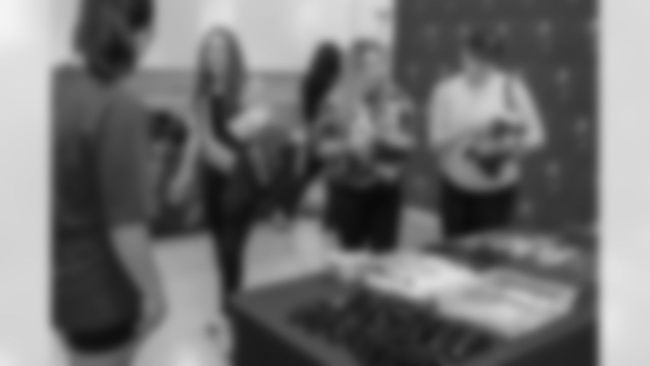 TAMPA, FL - December 06, 2025 - She is Football Bayshore Walk: Raise The Flags event with Bayshore Breakfast Club and Tampa Girls Social & Wellness at Hyde House Public Studio. Photo By Mike Carlson/Tampa Bay Buccaneers