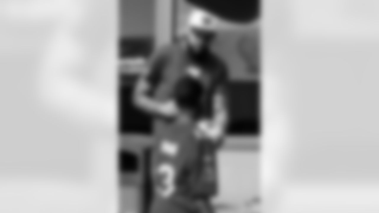 TAMPA, FL - December 05, 2025 - Mike and Ashli Evans host the Mike Evans Family Foundation 'Catch for Christmas' holiday event at AdventHealth Training Center. Photo By Kyle Zedaker/Tampa Bay Buccaneers