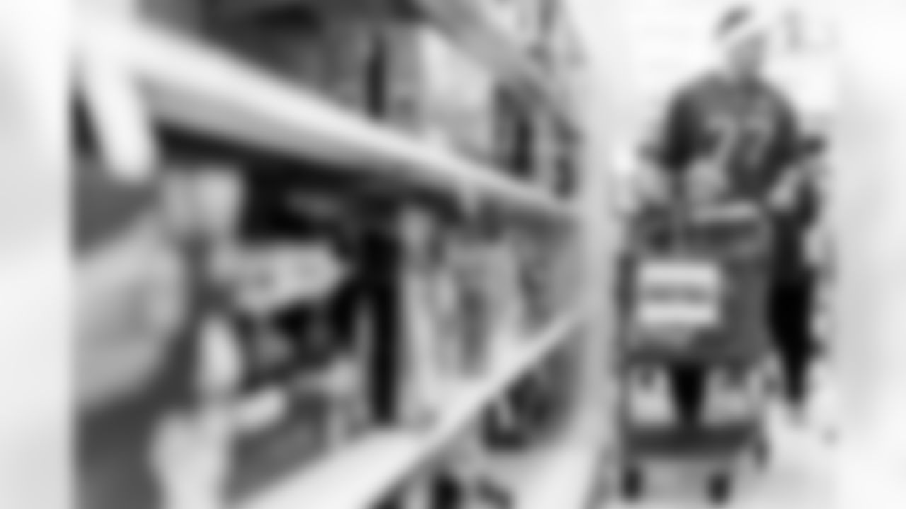 TAMPA, FL - December 15, 2025 - The Tampa Bay Buccaneers offensive line hosts the annual 'O-Line Lights Up Christmas' event providing holiday shopping sprees for local children. Photo By Kyle Zedaker/Tampa Bay Buccaneers