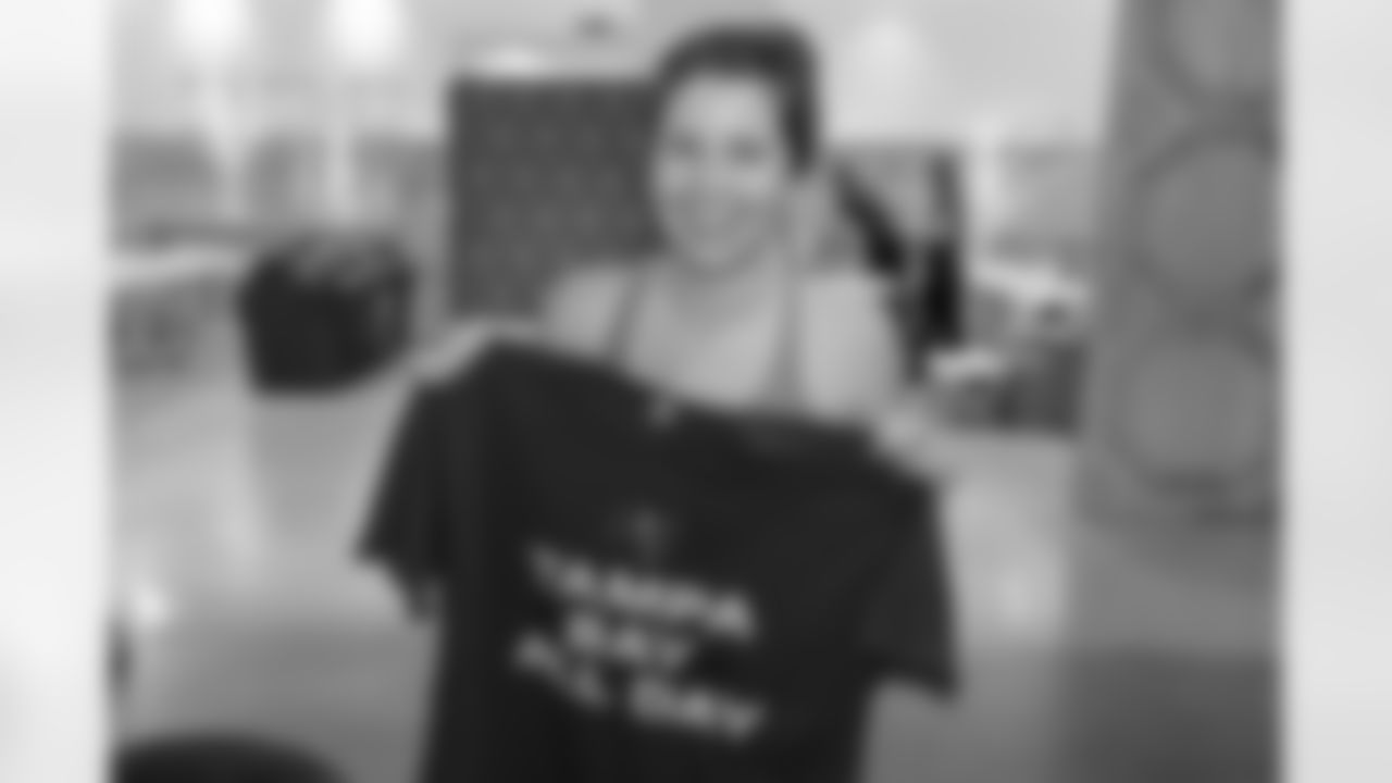 TAMPA, FL - December 06, 2025 - She is Football Bayshore Walk: Raise The Flags event with Bayshore Breakfast Club and Tampa Girls Social & Wellness at Hyde House Public Studio. Photo By Mike Carlson/Tampa Bay Buccaneers