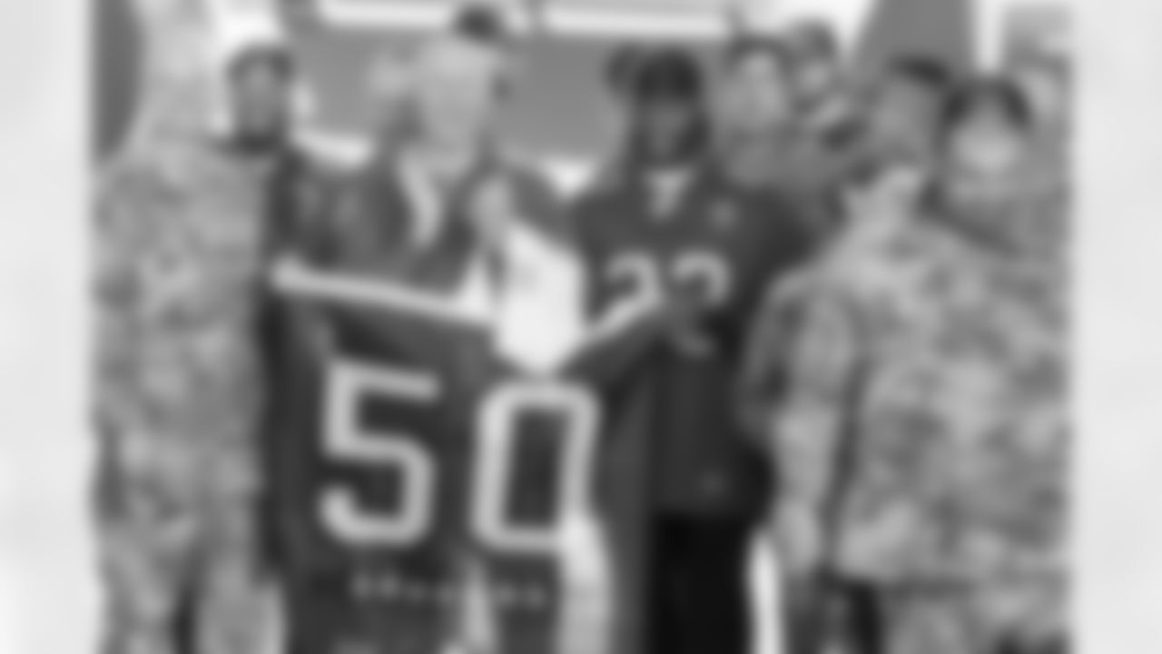 TAMPA, FL - December 02, 2025 - Colonel Edward V. Szczepanik and Safety Tykee Smith #23 of the Tampa Bay Buccaneers during a visit to MacDill Air Force Base. Photo By Kyle Zedaker/Tampa Bay Buccaneers