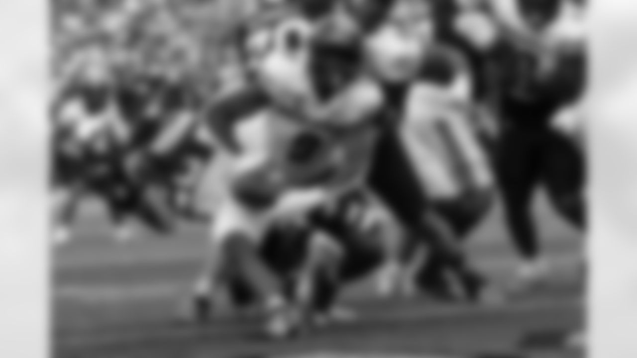 Vanderbilt running back Sedrick Alexander dives for yardage as he's tackled by Missouri defensive end Zion Young (9) during the second half of an NCAA college football game, Saturday, Oct. 25, 2025, in Nashville, Tenn. (AP Photo/Wade Payne)