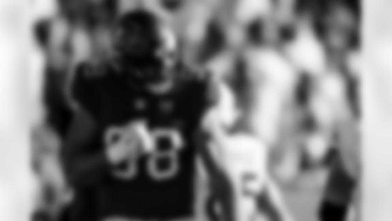 TAMPA, FL - November 30, 2025 - Outside Linebacker Anthony Nelson #98 of the Tampa Bay Buccaneers celebrates a turnover on downs during the game between the Arizona Cardinals and Tampa Bay Buccaneers. The Bucs won the game, 20-17. Photo By Kyle Zedaker/Tampa Bay Buccaneers