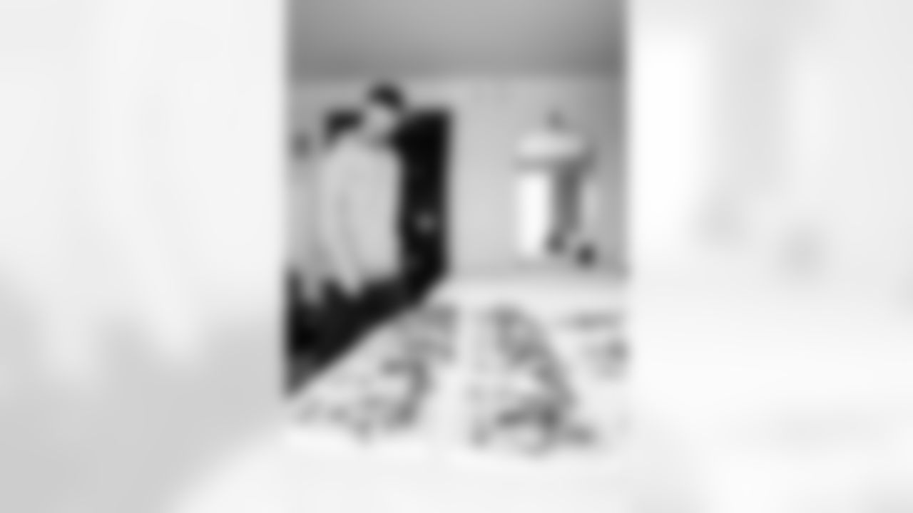 INDIANAPOLIS, IN - February 23, 2026 - College Scout Emmett Clifford receives his book and credentials for the 2026 NFL Combine at Lucas Oil Stadium. Photo By Tori Richman/Tampa Bay Buccaneers