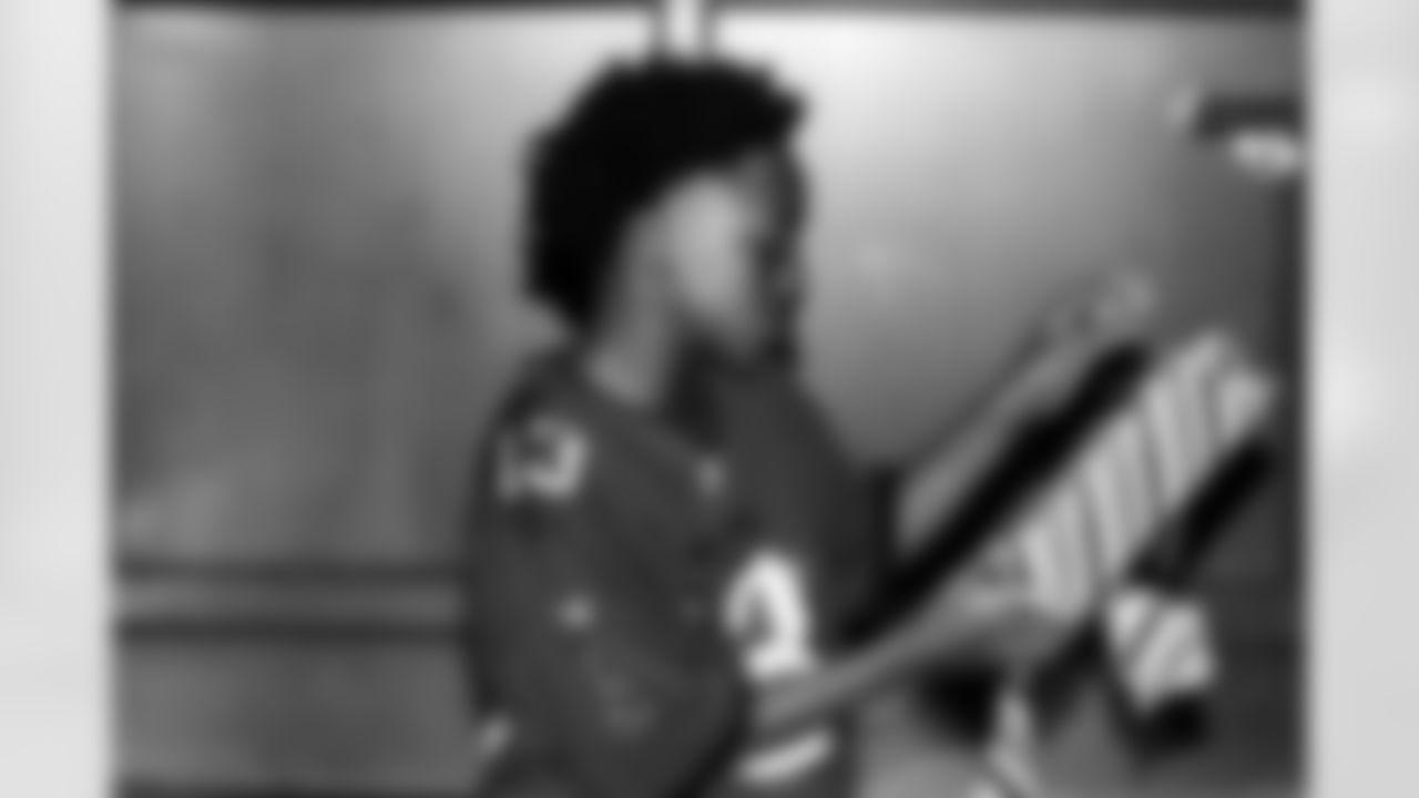 TAMPA, FL - December 05, 2025 - Mike and Ashli Evans host the Mike Evans Family Foundation 'Catch for Christmas' holiday event at AdventHealth Training Center. Photo By Kyle Zedaker/Tampa Bay Buccaneers