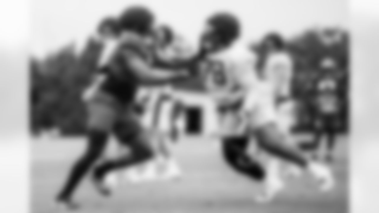 TAMPA, FL - November 06, 2025 - Outside Linebacker Yaya Diaby #0 and Tackle Tristan Wirfs #78 of the Tampa Bay Buccaneers during practice at AdventHealth Training Center. Photo By Tori Richman/Tampa Bay Buccaneers