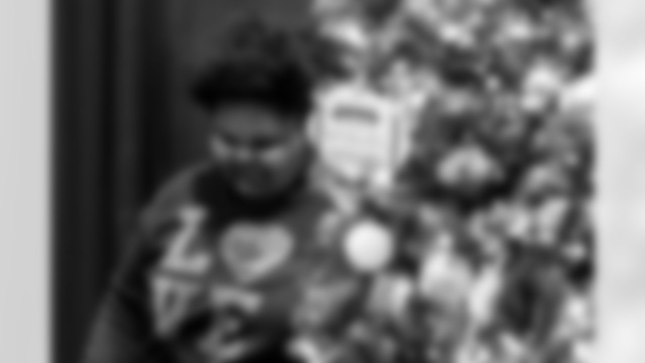 TAMPA, FL - December 05, 2025 - Mike and Ashli Evans host the Mike Evans Family Foundation 'Catch for Christmas' holiday event at AdventHealth Training Center. Photo By Kyle Zedaker/Tampa Bay Buccaneers