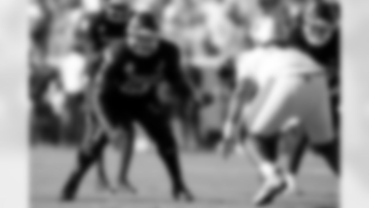 Texas A&M offensive lineman Ar'maj Reed-Adams (55) sets up to block an Auburn defender during the first half of an NCAA college football game Saturday, Sept. 27, 2025, in College Station, Texas. (AP Photo/Sam Craft)