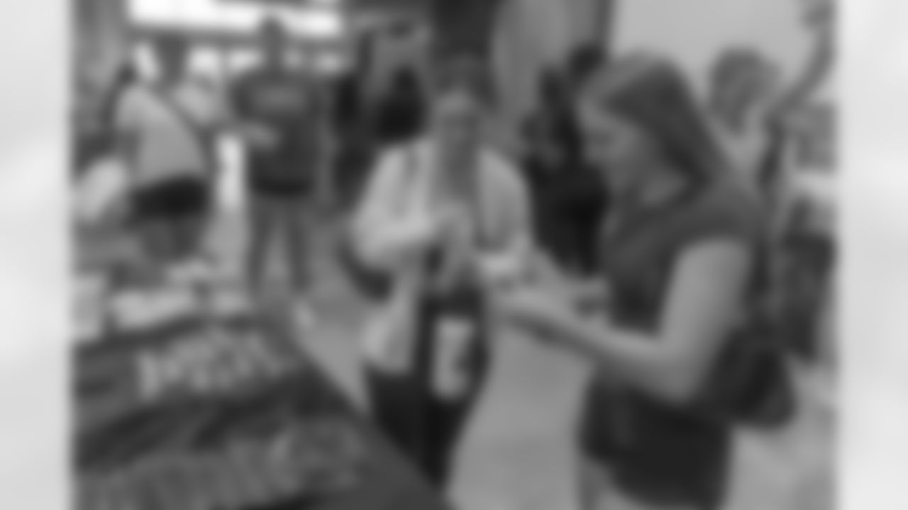 TAMPA, FL - December 06, 2025 - She is Football Bayshore Walk: Raise The Flags event with Bayshore Breakfast Club and Tampa Girls Social & Wellness at Hyde House Public Studio. Photo By Mike Carlson/Tampa Bay Buccaneers