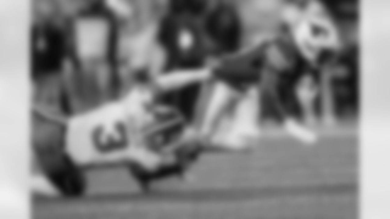 Clemson defensive end T.J. Parker (3) tackles SMU wide receiver Roderick Daniels Jr., right, in the first half of the Atlantic Coast Conference championship NCAA college football game Saturday, Dec. 7, 2024, in Charlotte, N.C. (AP Photo/Jacob Kupferman)