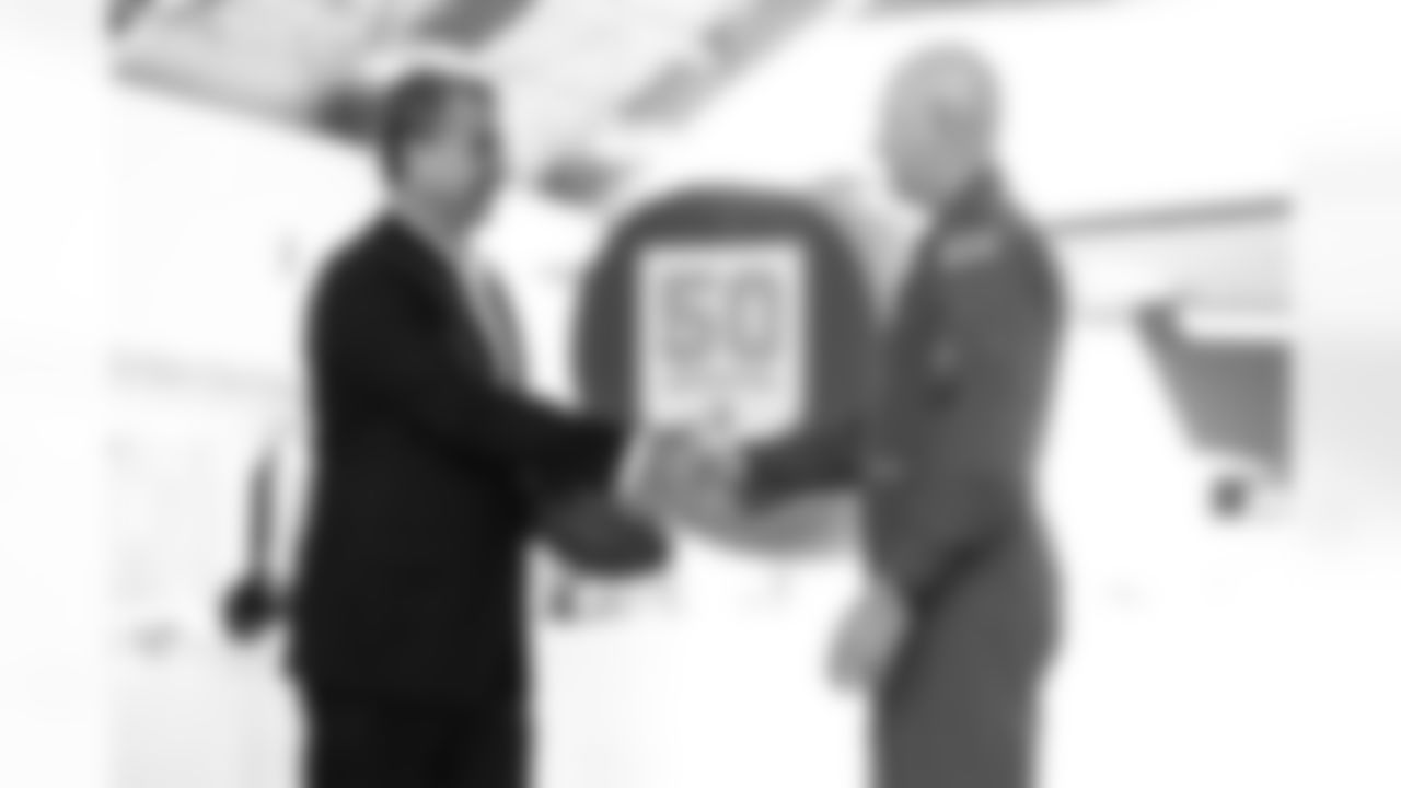 TAMPA, FL - December 02, 2025 - Brian Ford and Colonel Edward V. Szczepanik during a visit to MacDill Air Force Base. Photo By Kyle Zedaker/Tampa Bay Buccaneers