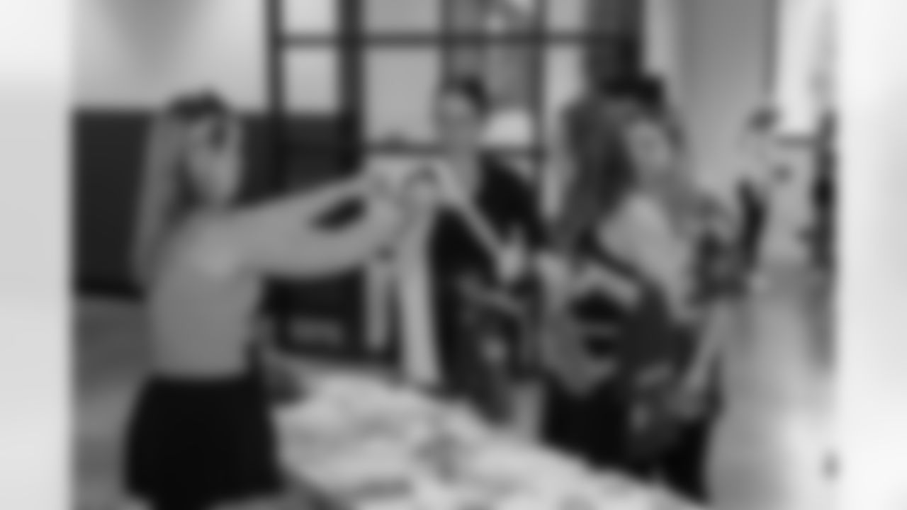 TAMPA, FL - December 06, 2025 - Participants arrive for the She is Football Bayshore Walk: Raise The Flags event with Bayshore Breakfast Club and Tampa Girls Social & Wellness at Hyde House Public Studio. Photo By Mike Carlson/Tampa Bay Buccaneers