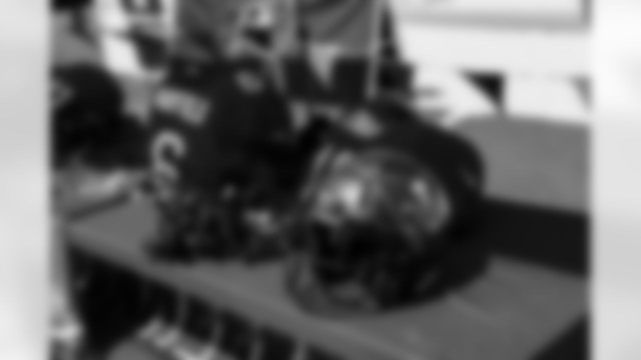 ST. PETE BEACH, FL - April 26, 2025 - Helmet and uniform during Bucs Beach Bash. Photo By Dave Pullis/Tampa Bay Buccaneers