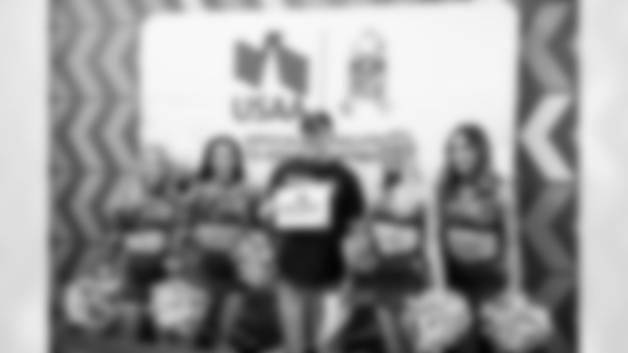 TAMPA, FL - December 02, 2025 - Tampa Bay Buccaneers Cheerleaders during a visit to MacDill Air Force Base. Photo By Kyle Zedaker/Tampa Bay Buccaneers