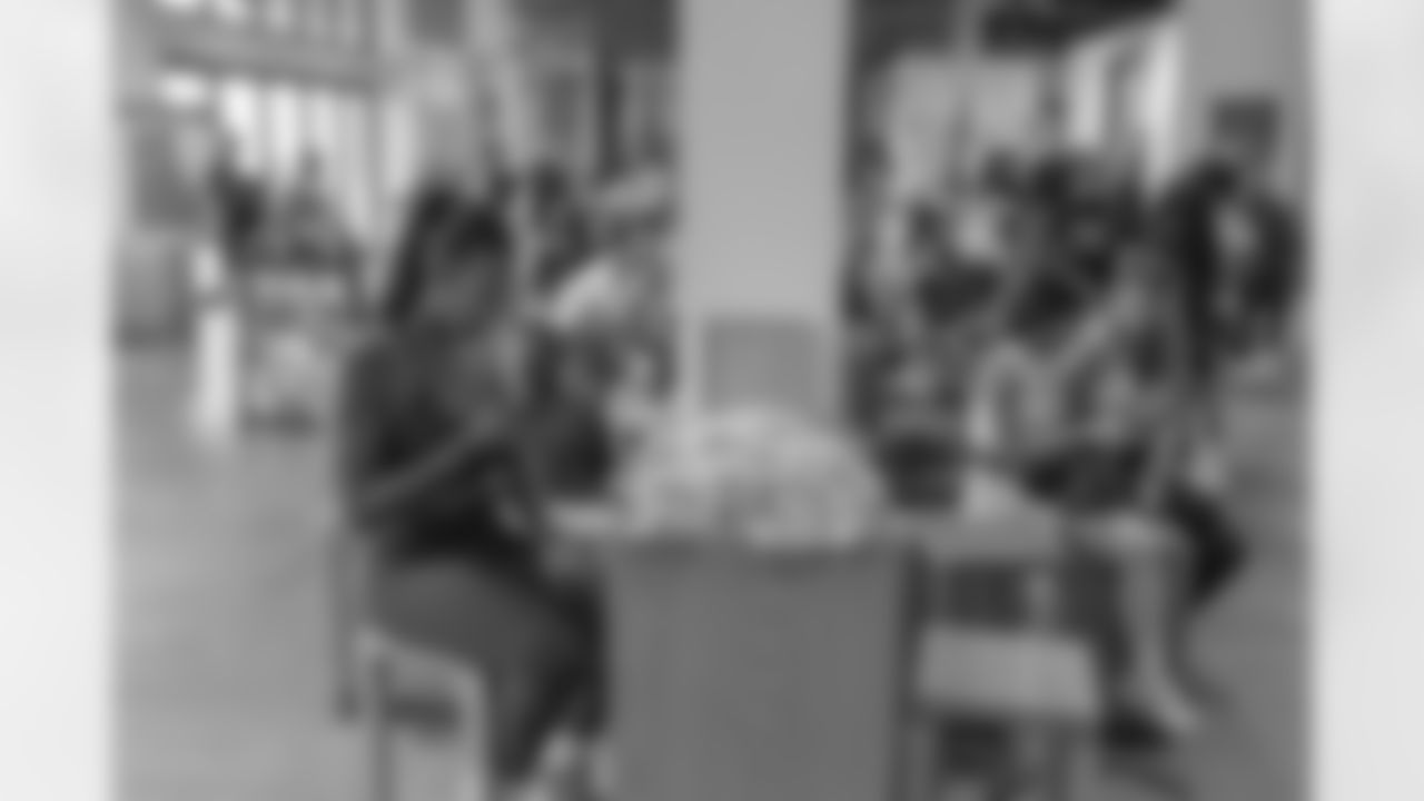 TAMPA, FL - December 06, 2025 - She is Football Bayshore Walk: Raise The Flags event with Bayshore Breakfast Club and Tampa Girls Social & Wellness at Hyde House Public Studio. Photo By Mike Carlson/Tampa Bay Buccaneers