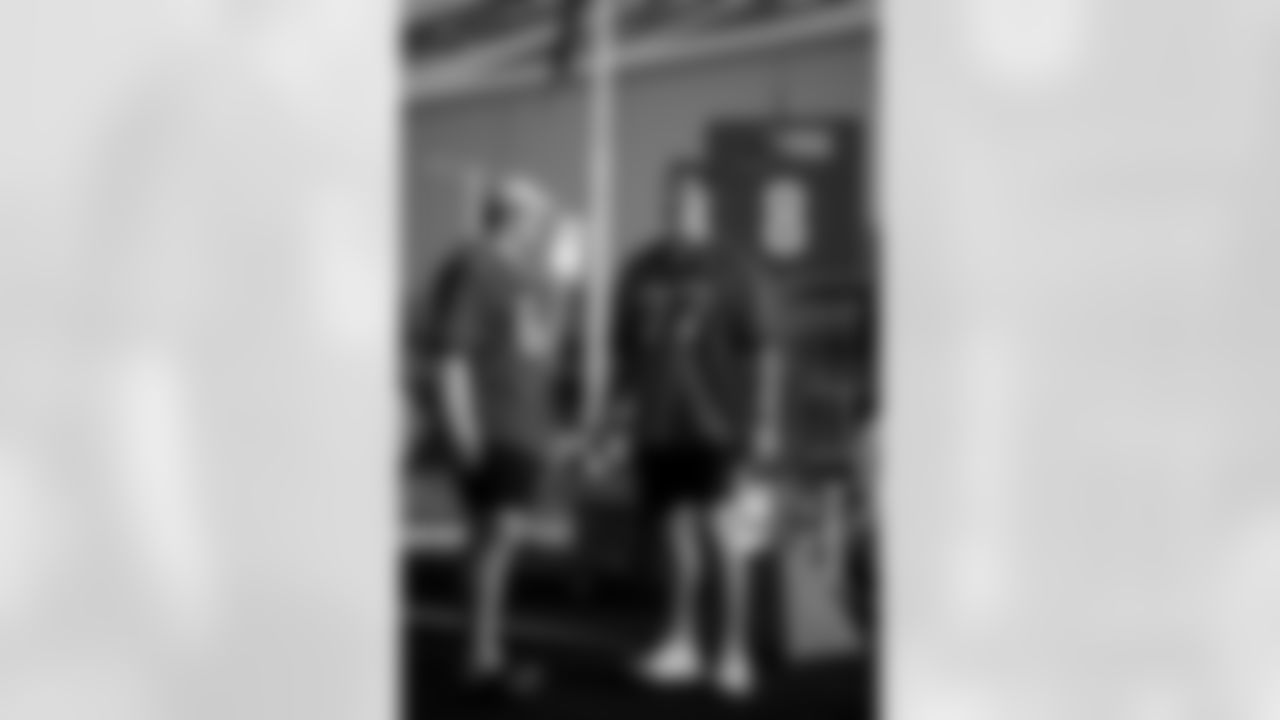 TAMPA, FL - November 25, 2025 - Center Graham Barton #62 and Offensive Tackle Charlie Heck #77 of the Tampa Bay Buccaneers during Turkey Time with the O-Line. Photo By Kyle Zedaker/Tampa Bay Buccaneers