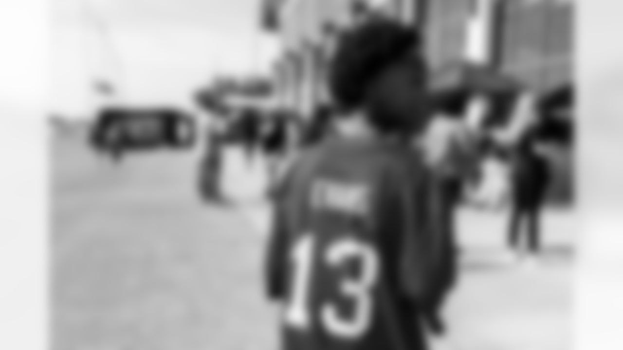 TAMPA, FL - December 05, 2025 - Mike and Ashli Evans host the Mike Evans Family Foundation 'Catch for Christmas' holiday event at AdventHealth Training Center. Photo By Kyle Zedaker/Tampa Bay Buccaneers