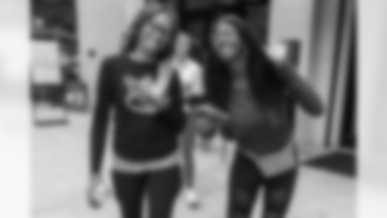 TAMPA, FL - December 06, 2025 - She is Football Bayshore Walk: Raise The Flags event with Bayshore Breakfast Club and Tampa Girls Social & Wellness at Hyde House Public Studio. Photo By Mike Carlson/Tampa Bay Buccaneers