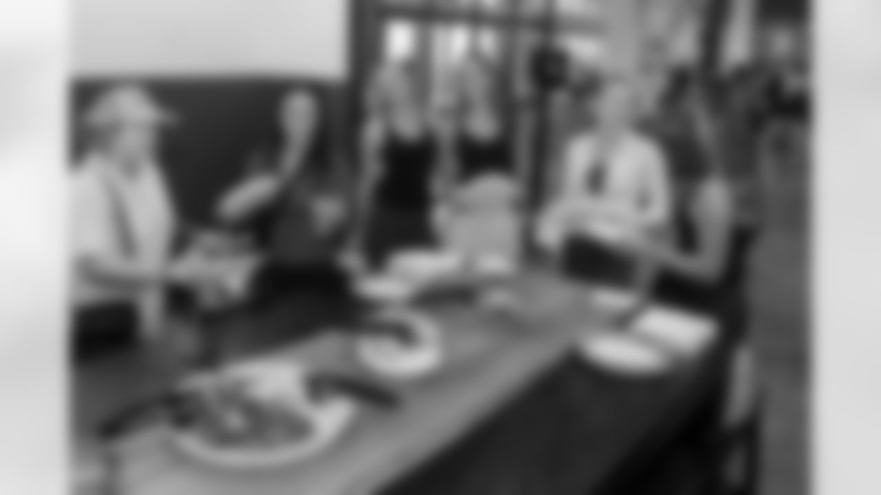 TAMPA, FL - December 06, 2025 - She is Football Bayshore Walk: Raise The Flags event with Bayshore Breakfast Club and Tampa Girls Social & Wellness at Hyde House Public Studio. Photo By Mike Carlson/Tampa Bay Buccaneers