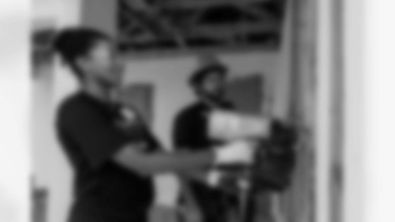 TAMPA, FL - November 18, 2025 - Volunteers during a home build with Habitat for Humanity of Tampa Bay Hillsborough. Photo By Doug DeFelice/Tampa Bay Buccaneers