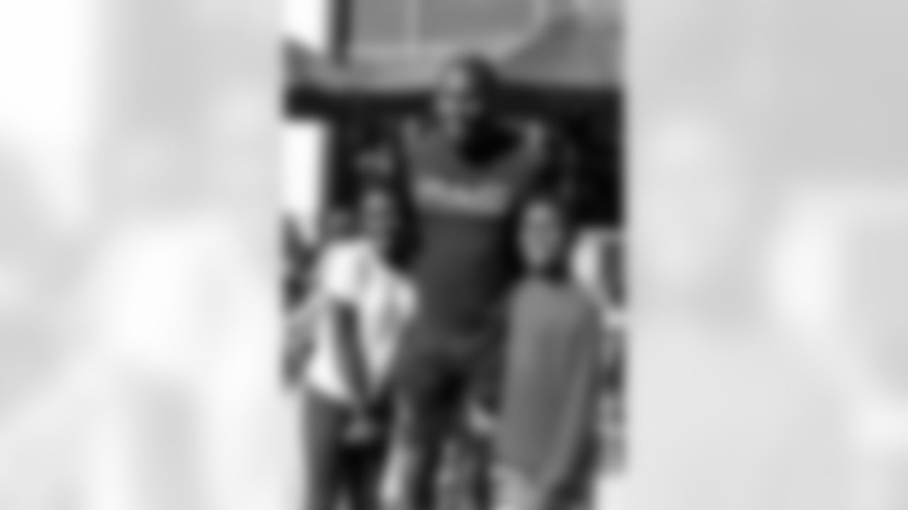 TAMPA, FL - December 05, 2025 - Mike and Ashli Evans host the Mike Evans Family Foundation 'Catch for Christmas' holiday event at AdventHealth Training Center. Photo By Kyle Zedaker/Tampa Bay Buccaneers