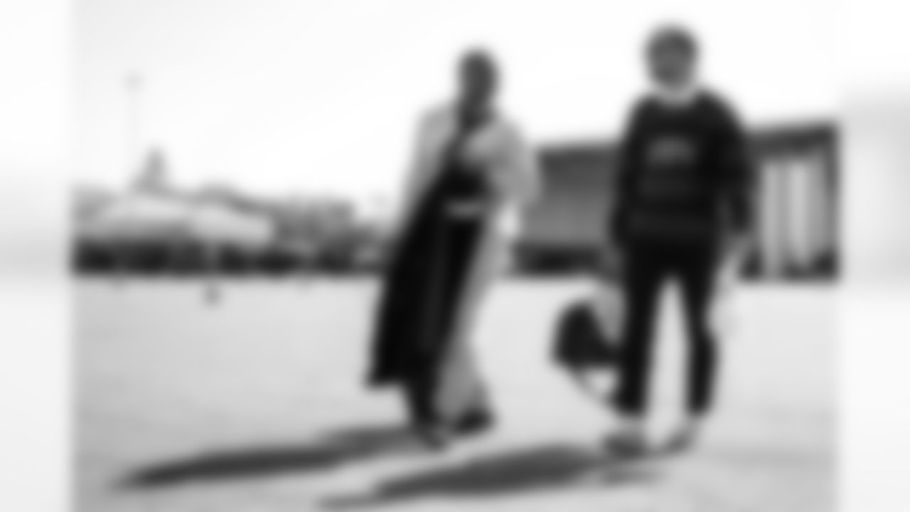 TAMPA, FL - November 15, 2025 - Wide Receivers Coach Bryan McClendon and Wide Receiver Emeka Egbuka #2 of the Tampa Bay Buccaneers depart before the Bucs' game against the Buffalo Bills. Photo By Tori Richman/Tampa Bay Buccaneers