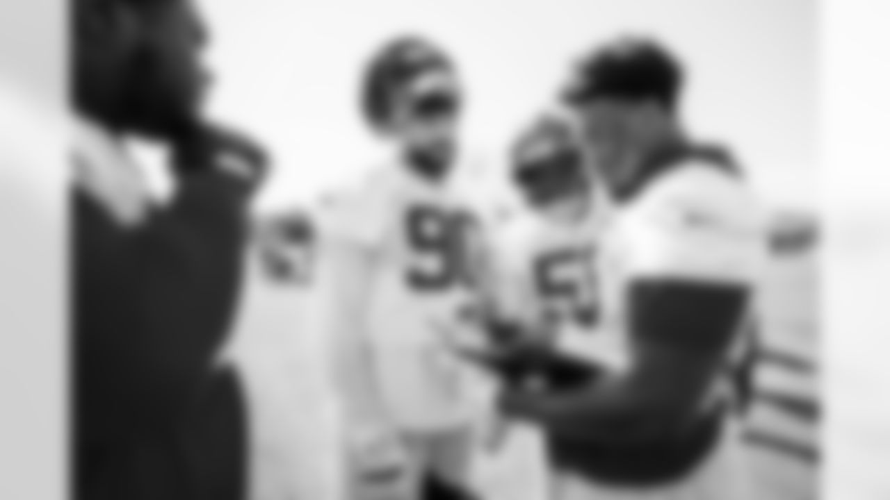 TAMPA, FL - December 04, 2025 - Defensive Lineman Logan Hall #90, Defensive Lineman C.J. Brewer #52 and Defensive Lineman Elijah Roberts #95 of the Tampa Bay Buccaneers during practice at AdventHealth Training Center. Photo By Tori Richman/Tampa Bay Buccaneers