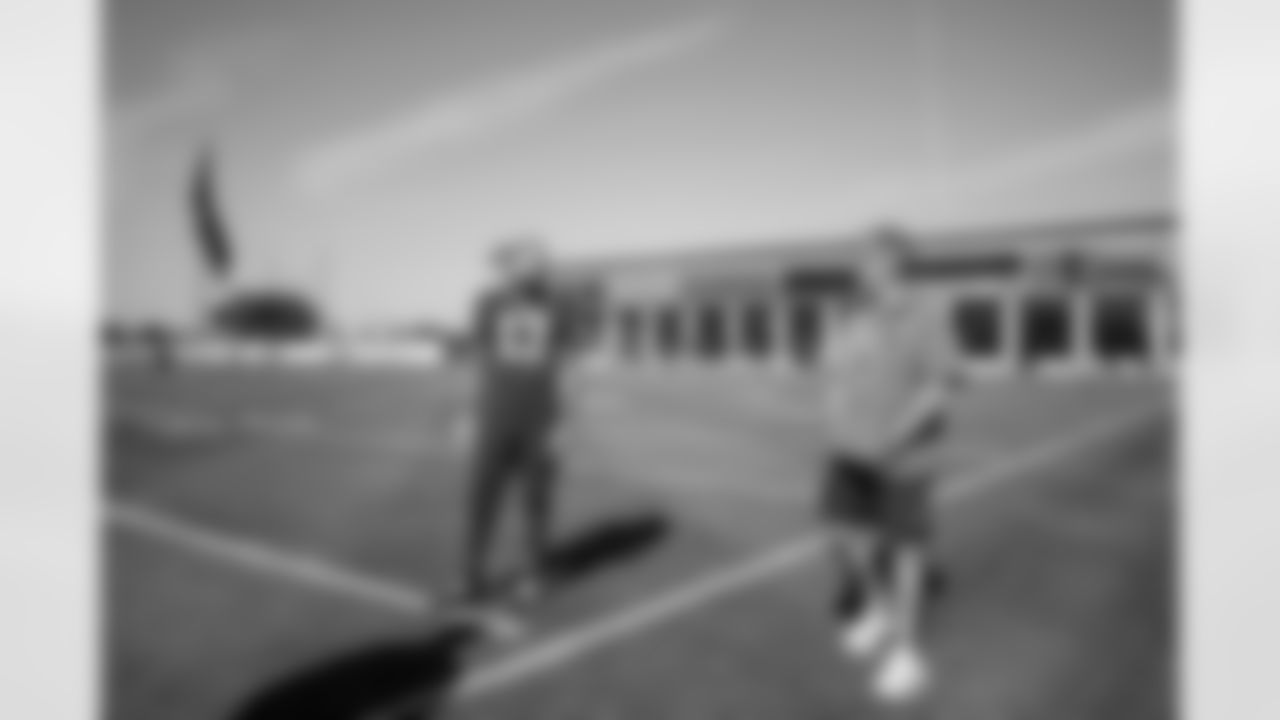 TAMPA, FL - December 04, 2025 - Wide Receiver Mike Evans #13 of the Tampa Bay Buccaneers and General Manager Jason Licht during practice at AdventHealth Training Center. Photo By Tori Richman/Tampa Bay Buccaneers