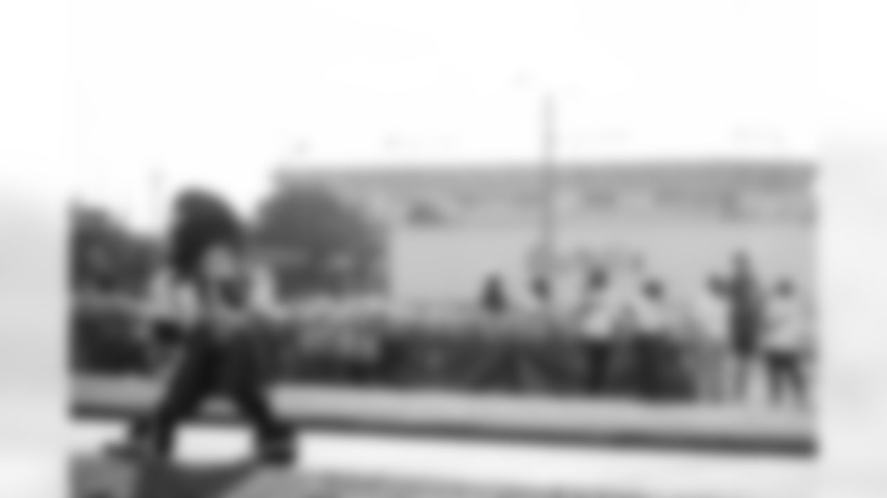 TAMPA, FL - November 25, 2025 - Captain Fear during Turkey Time with the O-Line. Photo By Kyle Zedaker/Tampa Bay Buccaneers