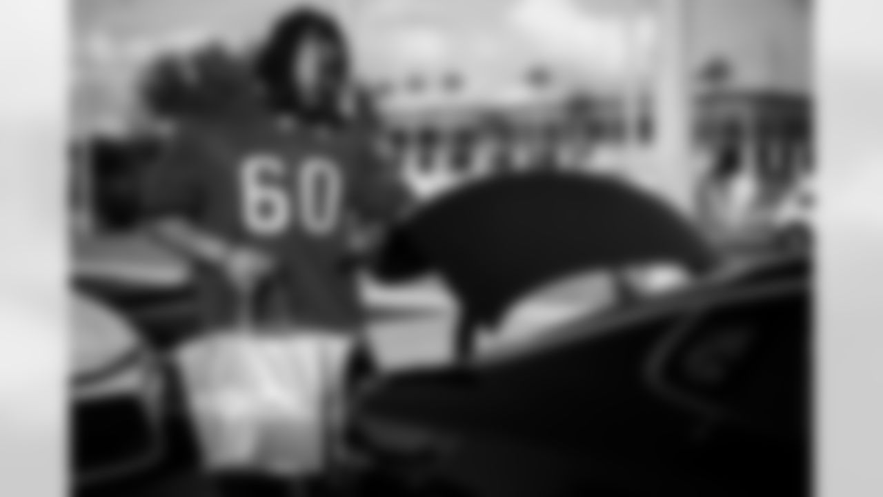 TAMPA, FL - November 25, 2025 - Guard Mike Jordan #60 of the Tampa Bay Buccaneers during Turkey Time with the O-Line. Photo By Kyle Zedaker/Tampa Bay Buccaneers